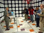 Prof. Todd Hubing describes Clemson Vehicular Electronics Laboratory Projects to Local News Reporters