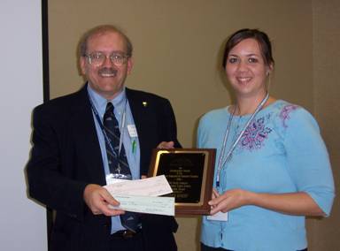 Mrs. Knight and Dr. Wagner receive award