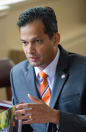 Anand Gramopadhye, Dean of Eng. & Science meeting with people in his office.