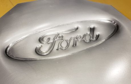 Incrementally formed Ford logo